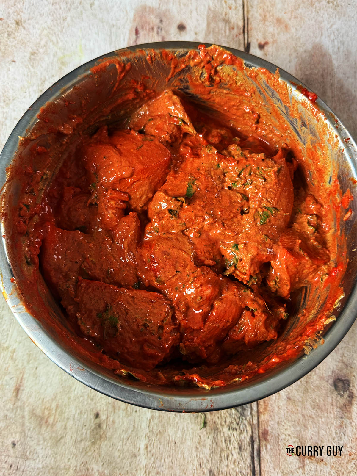 The second marinade applied to the chicken pieces.