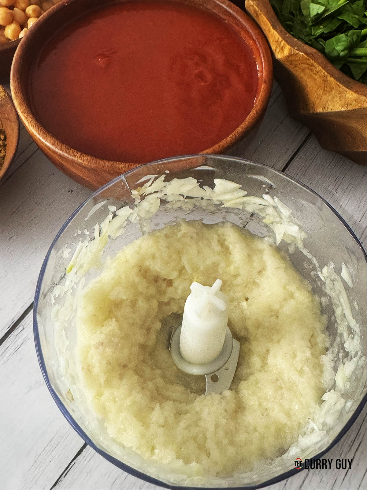 Blending the onions to a smooth paste.
