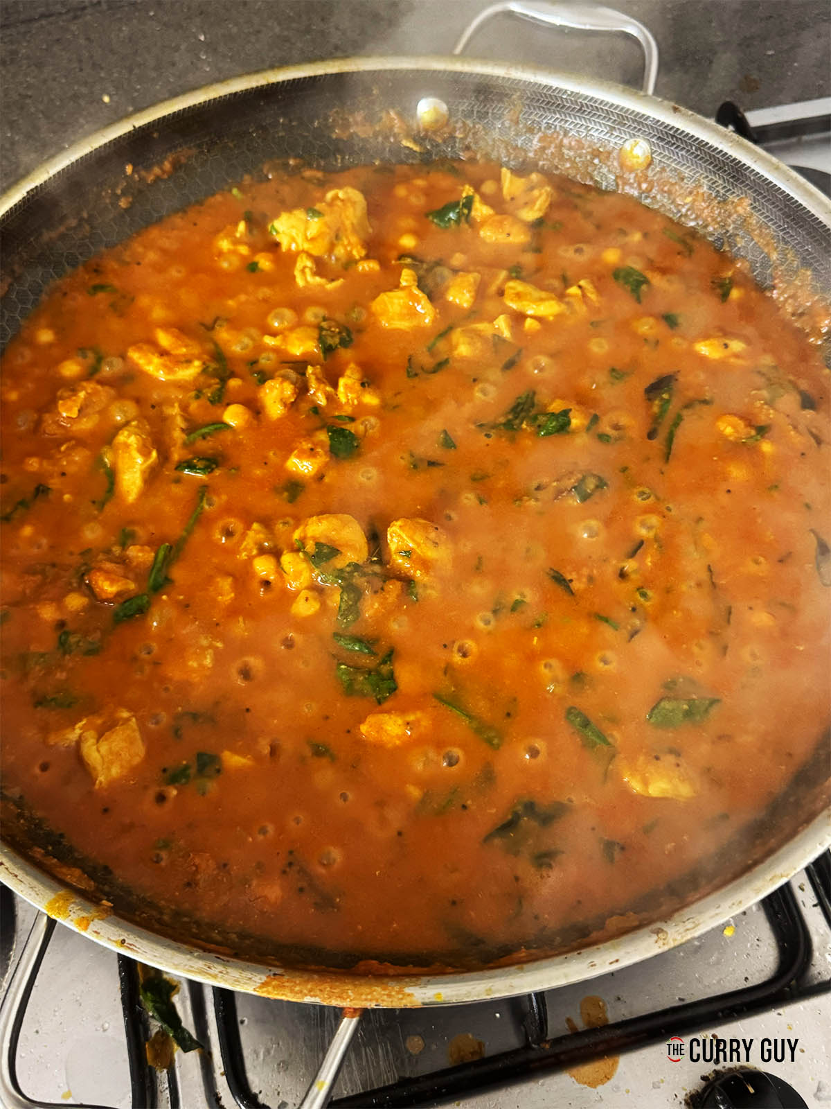 Simmering the sauce.