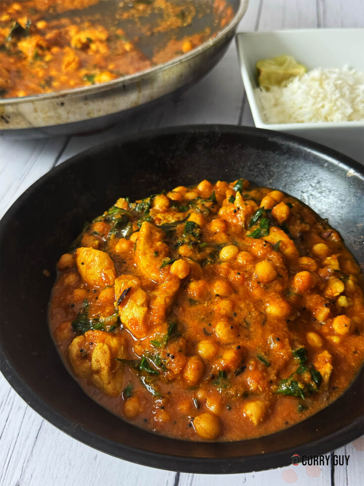The Chicken and chickpeas curry served at the table.