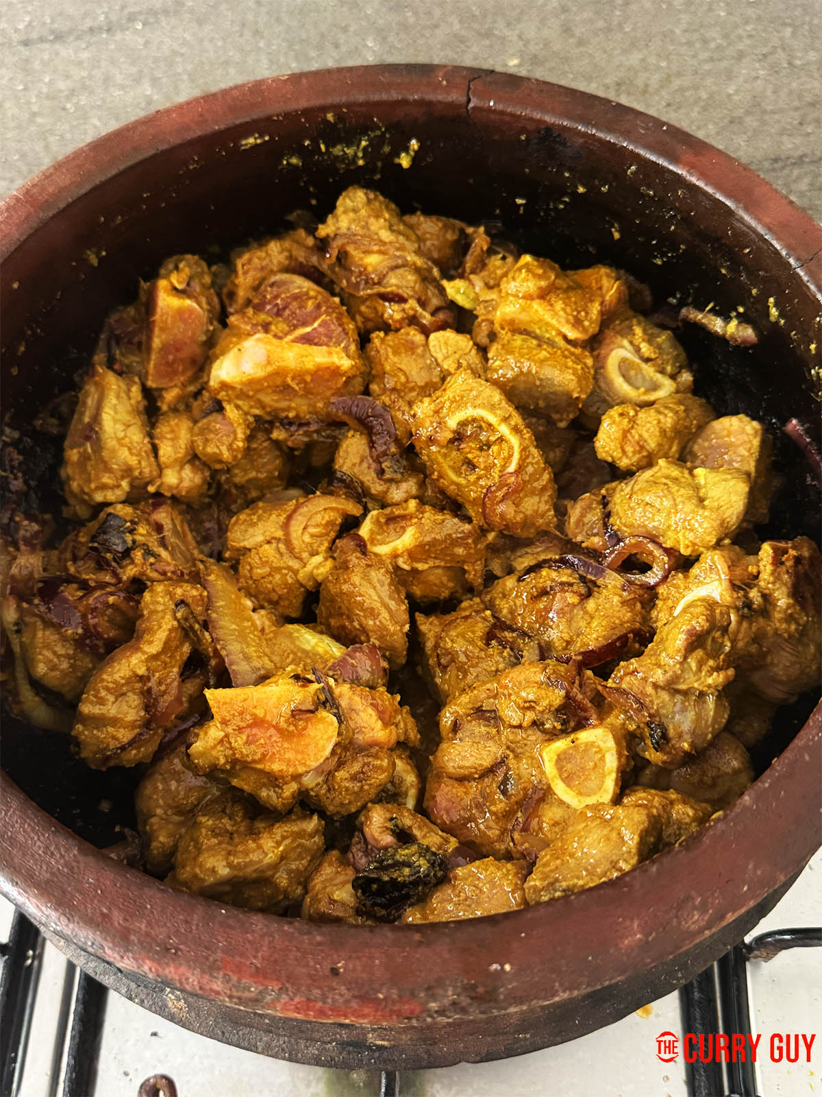 Browning the meat in the pot.
