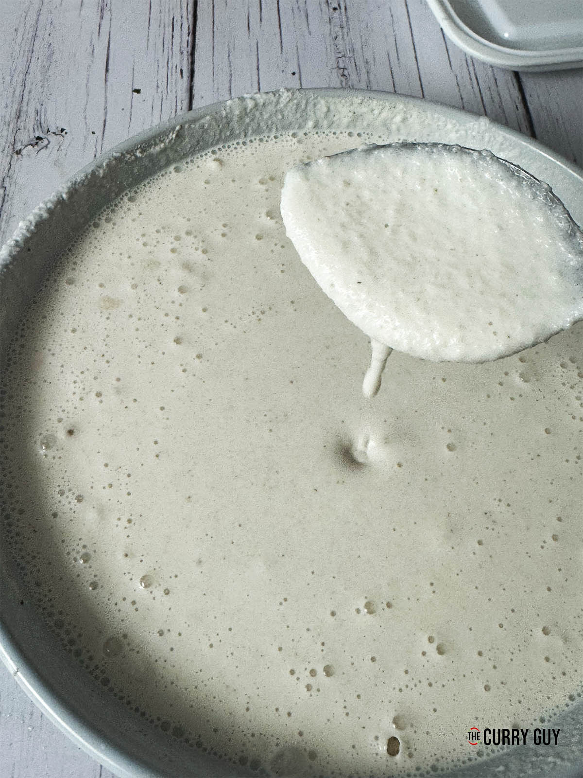 The blended rice in a bowl showing how creamy it is.