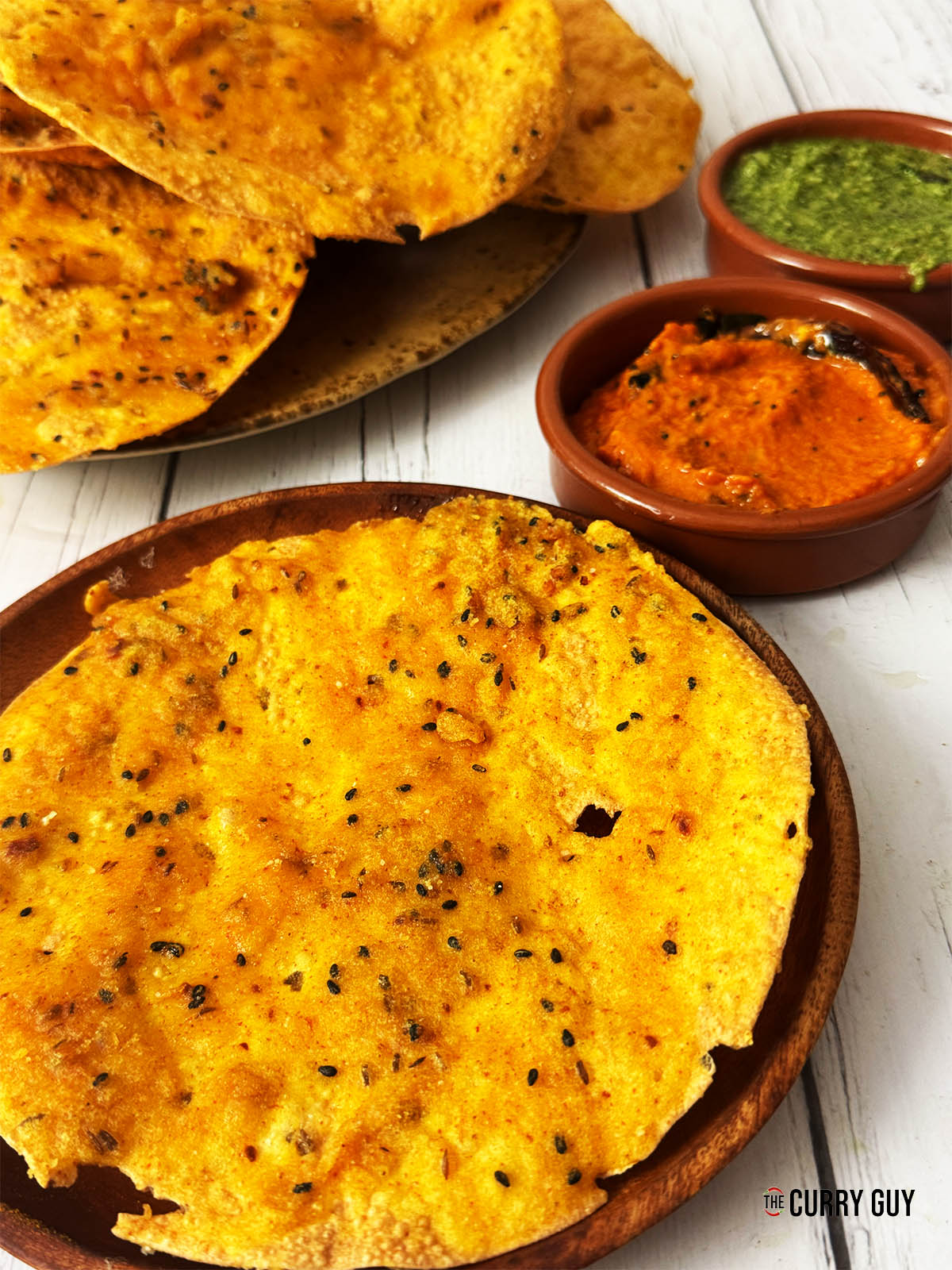 Serving the pappada vada with chutneys.