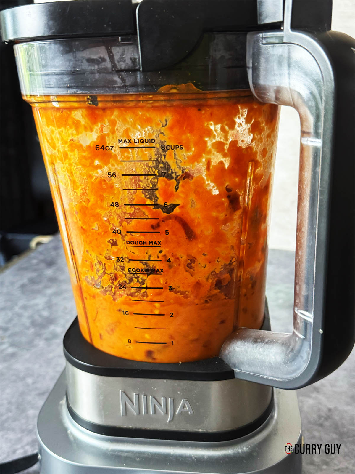 Blending the ingredients to a smooth paste.