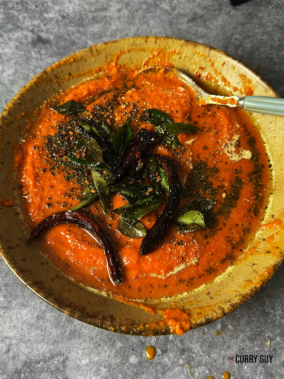 Red chilli chutney in a serving bowl.