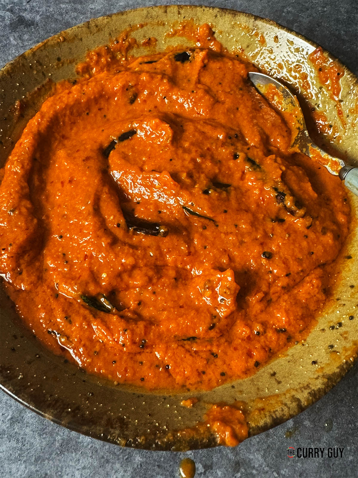 The red chilli chutney all stirred up and ready to serve.