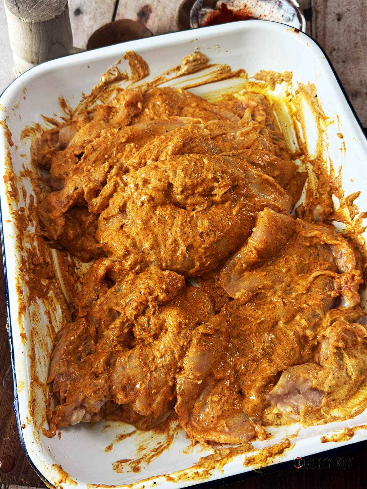 The chicken in the marinade.