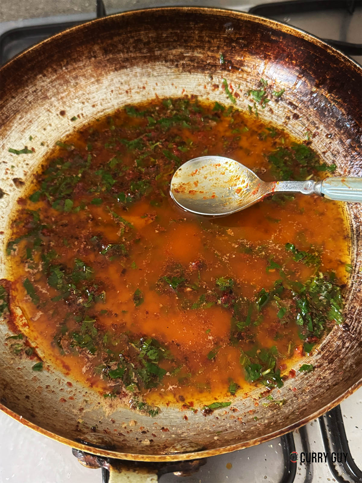 Adding red pepper paste to the butter sauce.