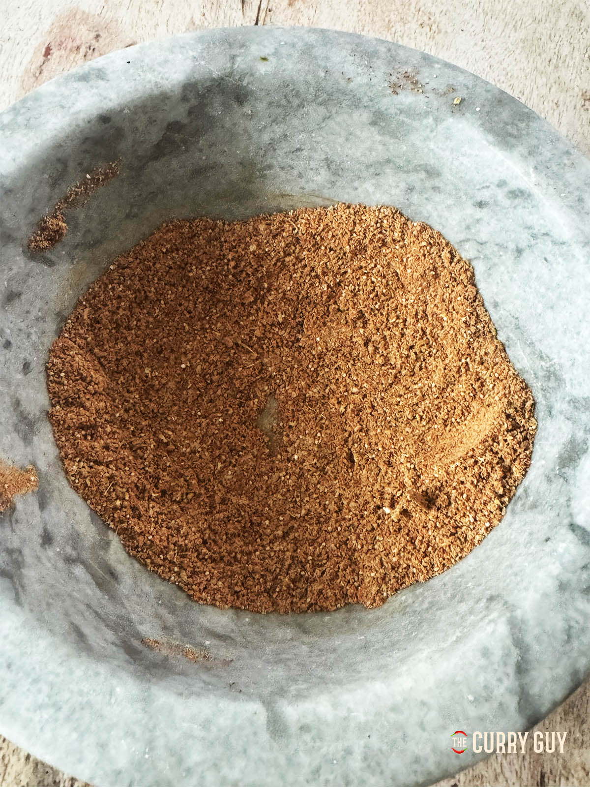 All of the spice ground together into a fine powder.