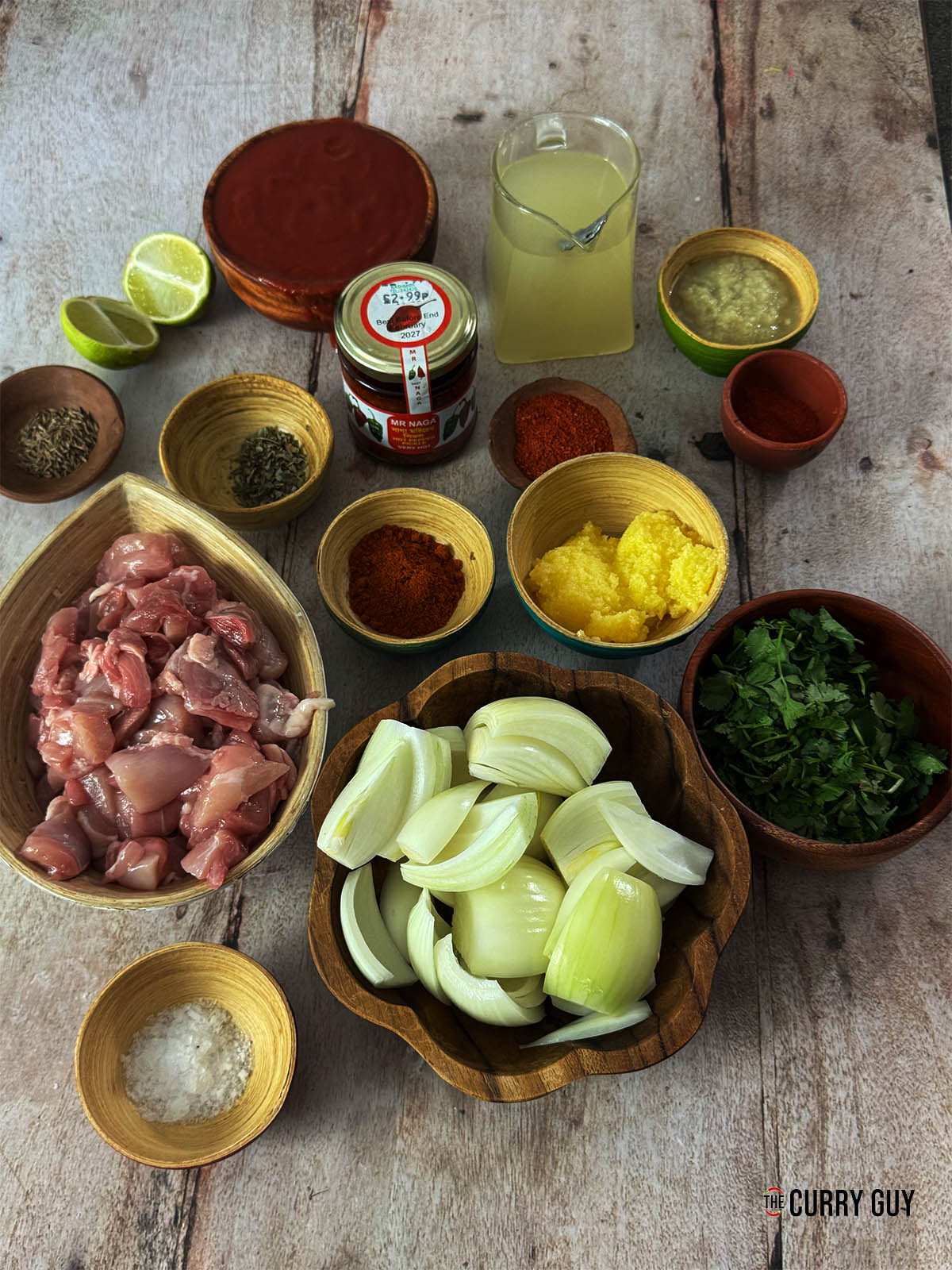 The ingredients for the curry laid out on a counter top.