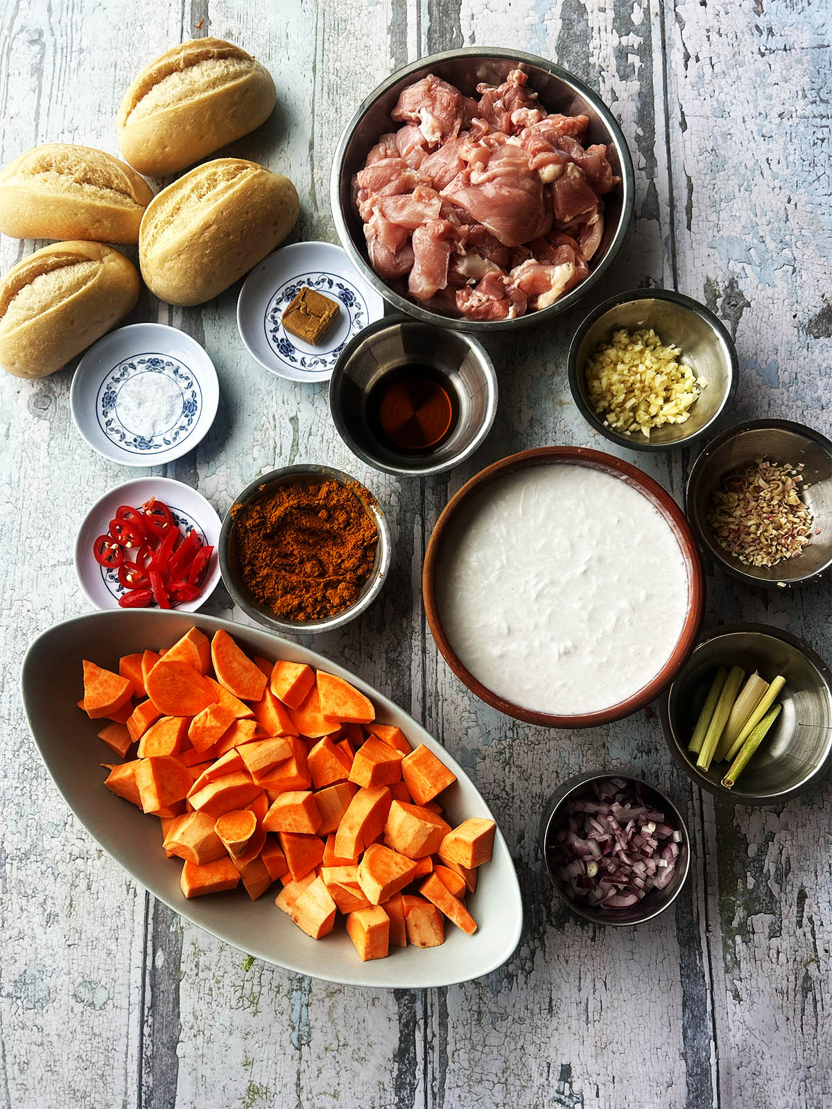 The ingredients for the curry laid out on a counter top.