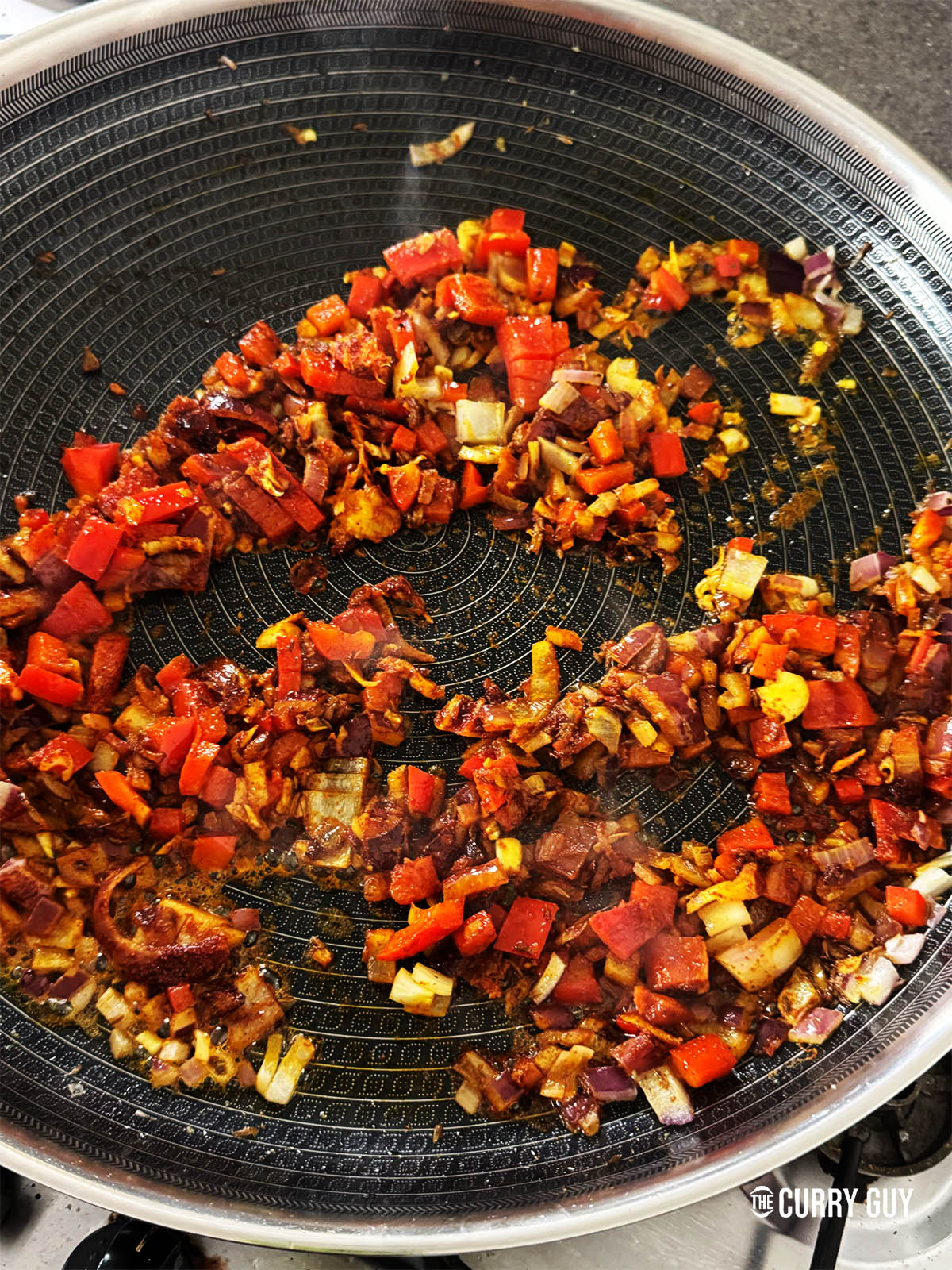 Stirring these ingredients to combine.