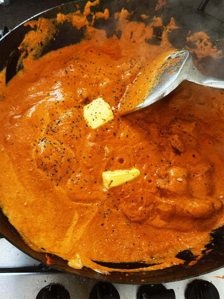 Butter melting into butter chicken curry.