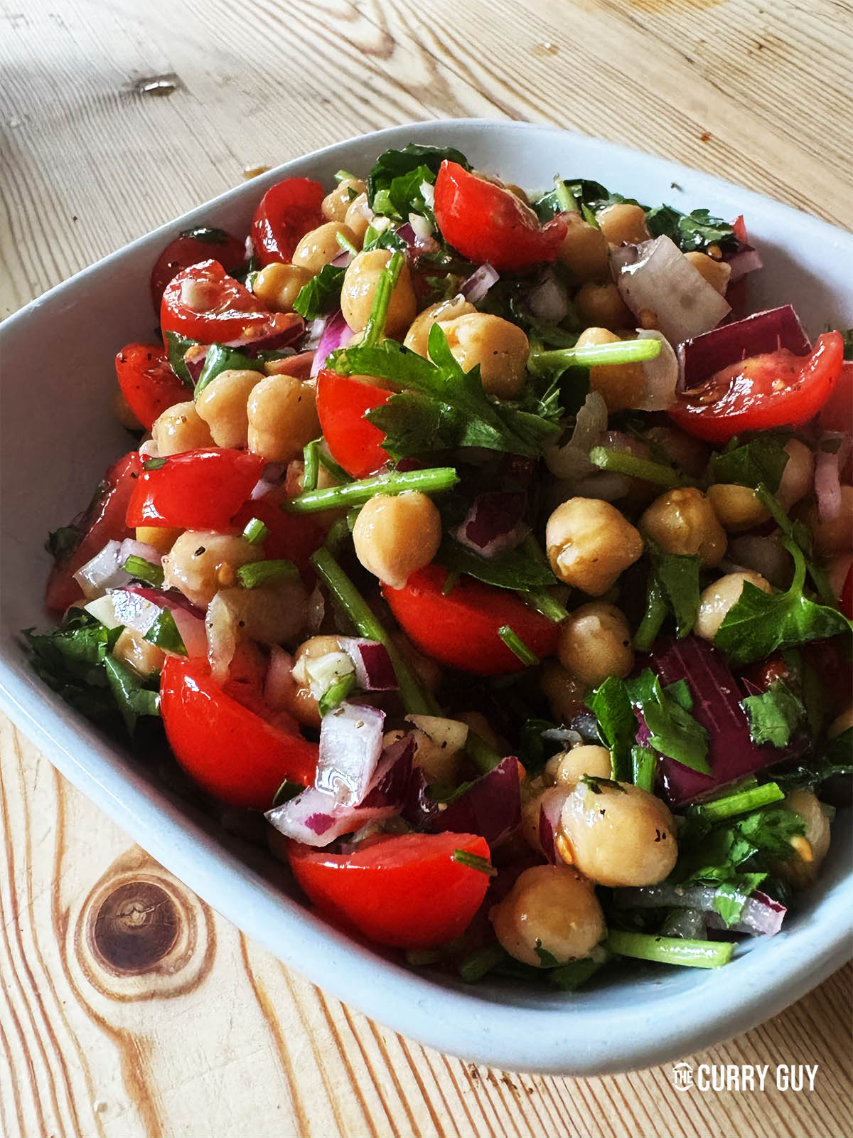 The completed chickpea salad served in a bowl