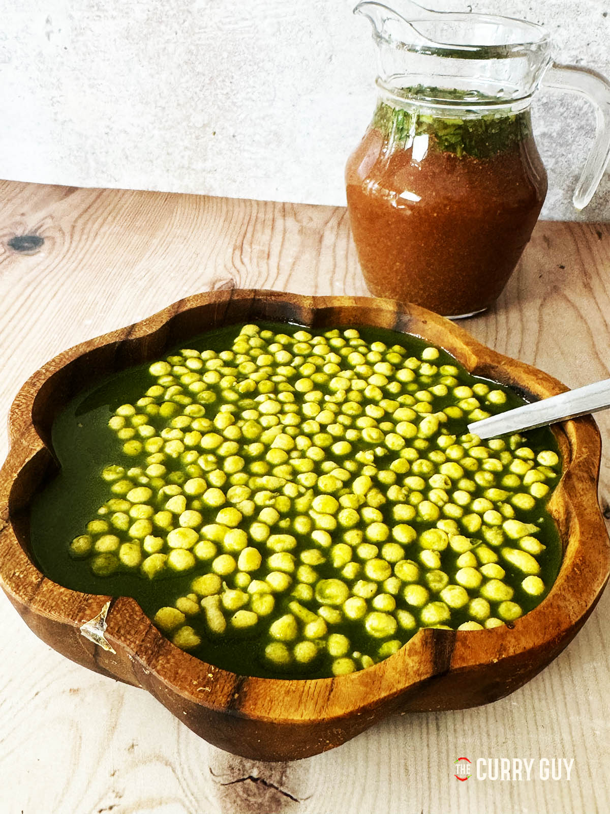 Green pani topped with bhundi.