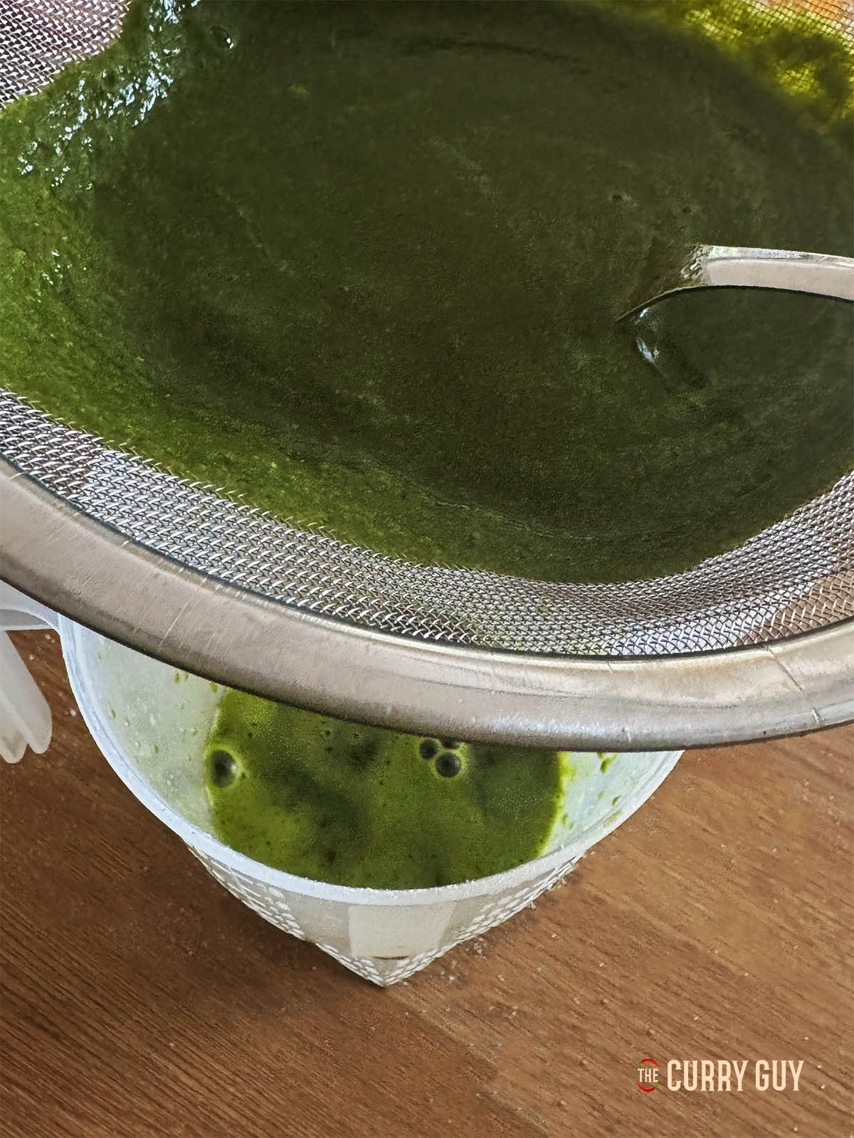 Adding another cup of water to the herb mixture and then running it through a sieve.