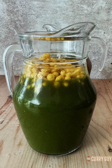 Green pani in a pouring jug.