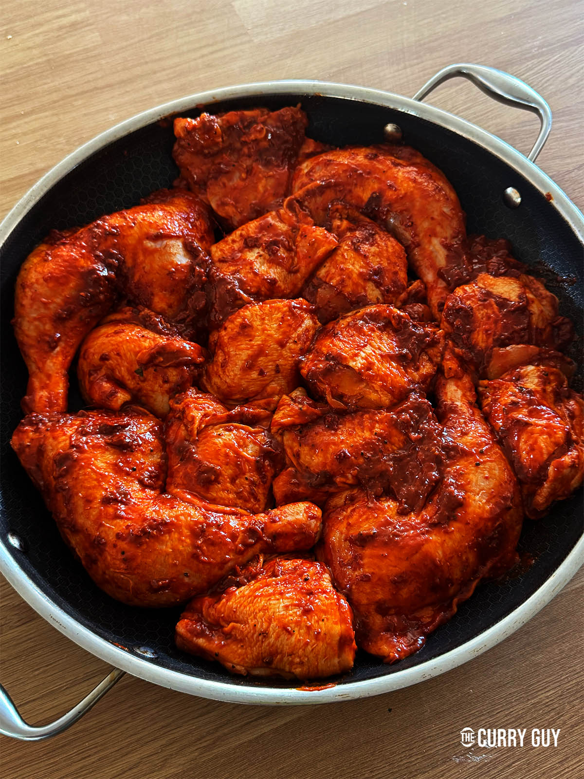 The chicken in an oven proof pan.