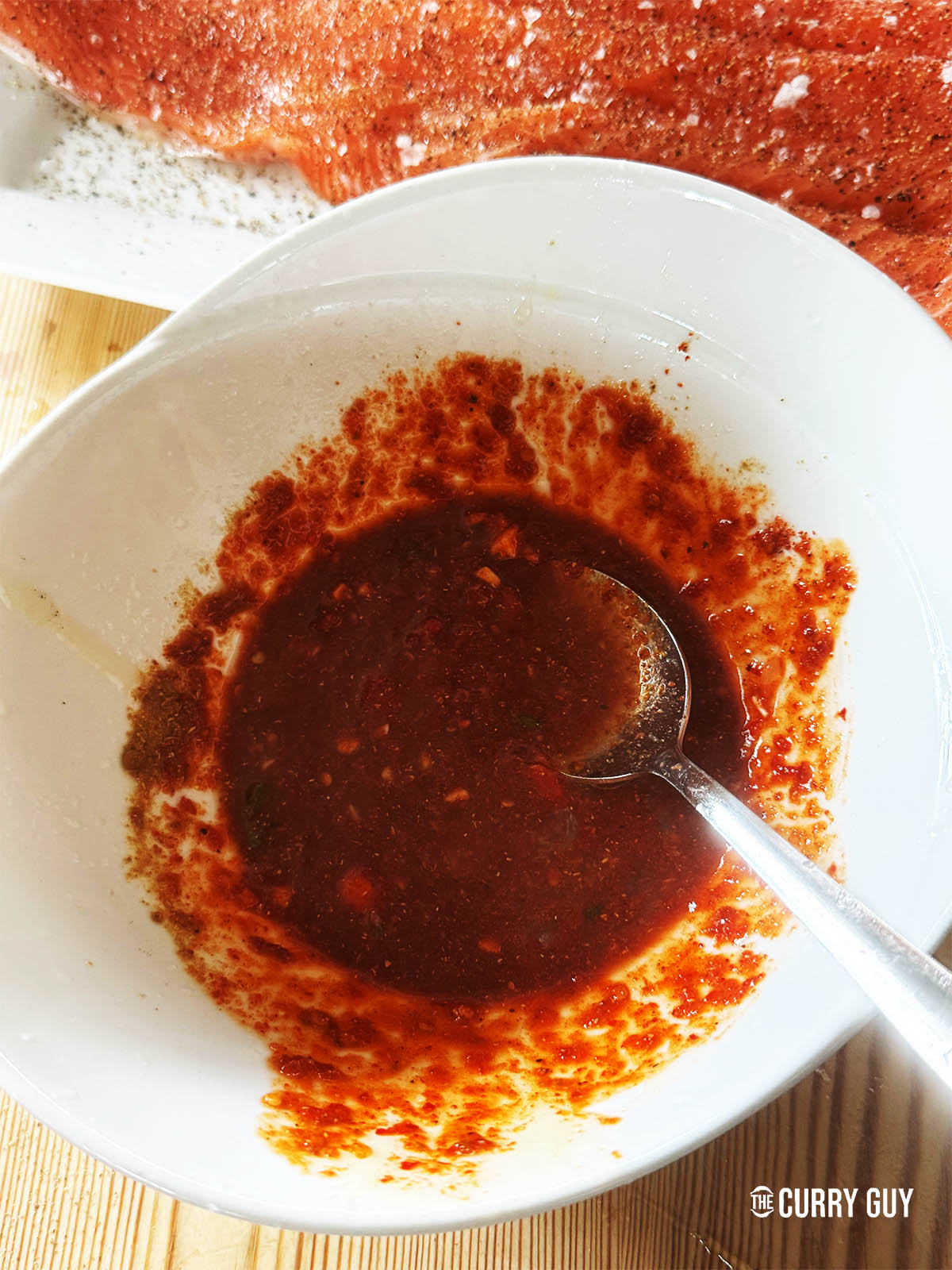 Whisking these ingredients together until smooth and well combined