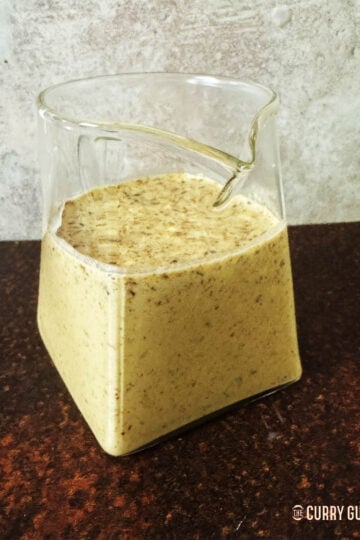 Japanese salad dressing in a pouring jug.