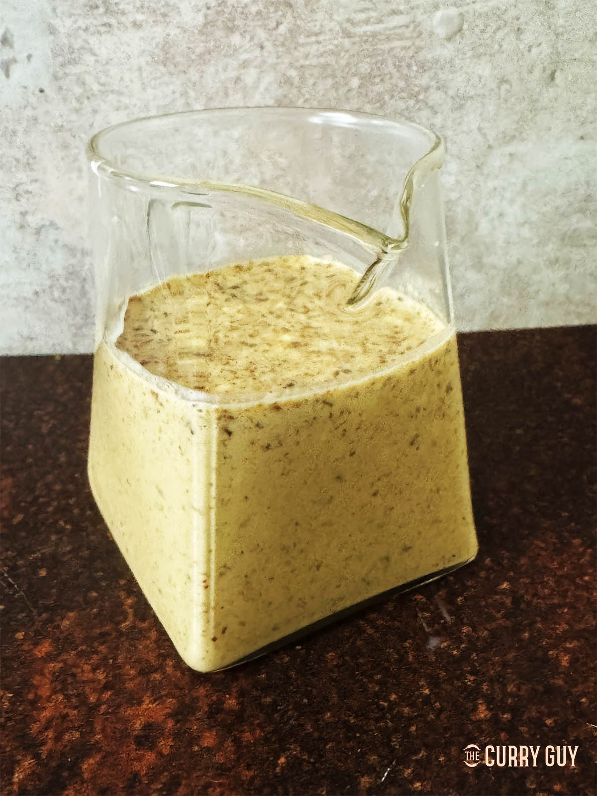 Japanese salad dressing in a pouring jug.