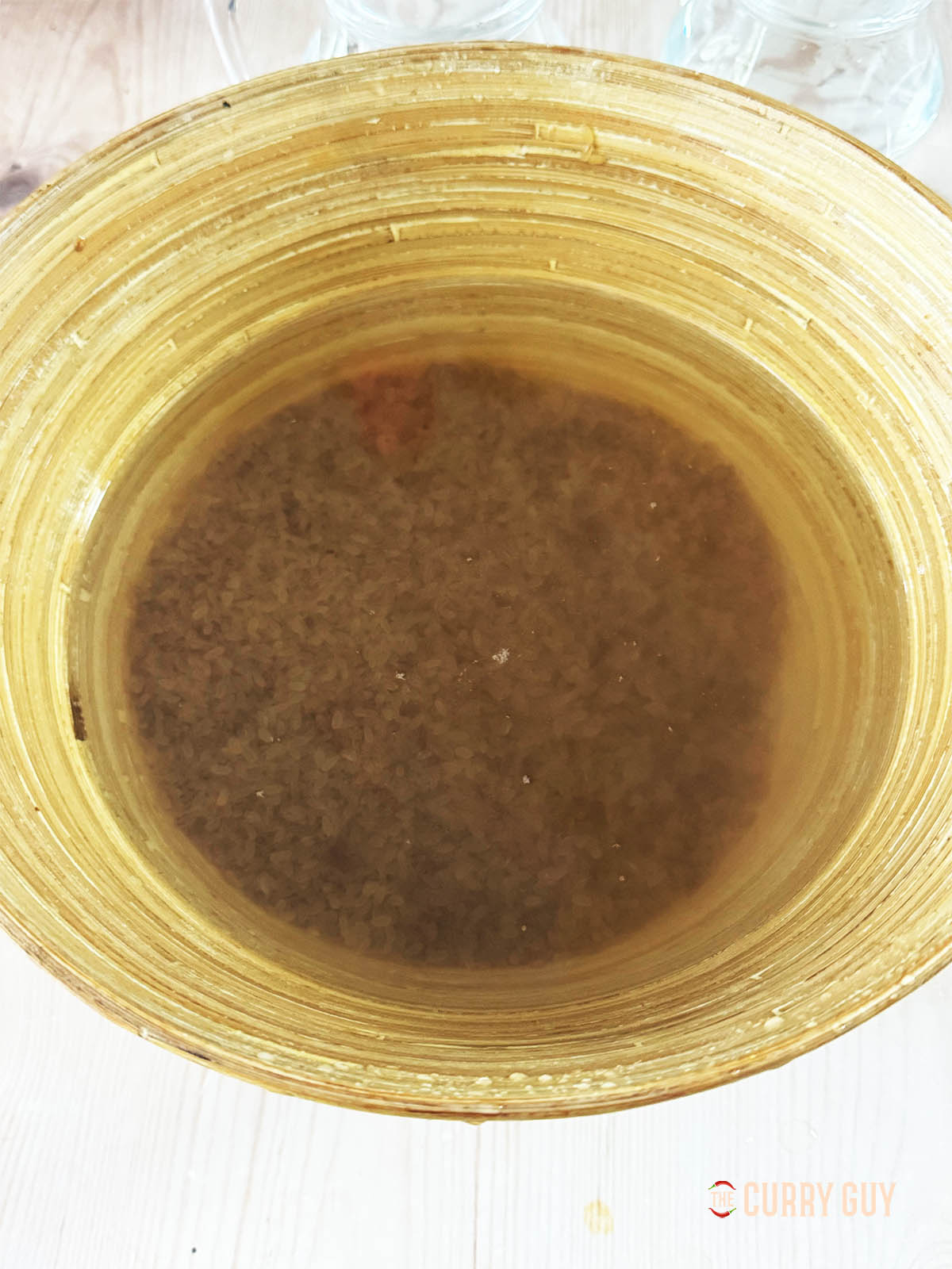 The washed Matta rice soaking in fresh water for 2 hours.