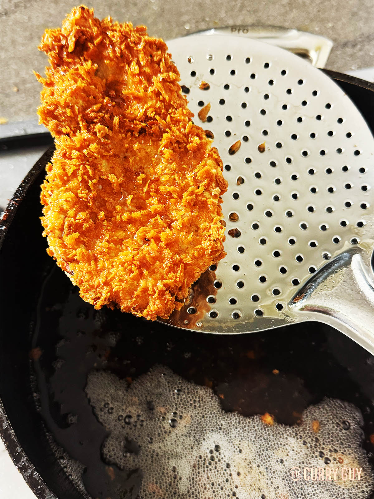 Golden brown tonkatsu cooked and ready to serve.