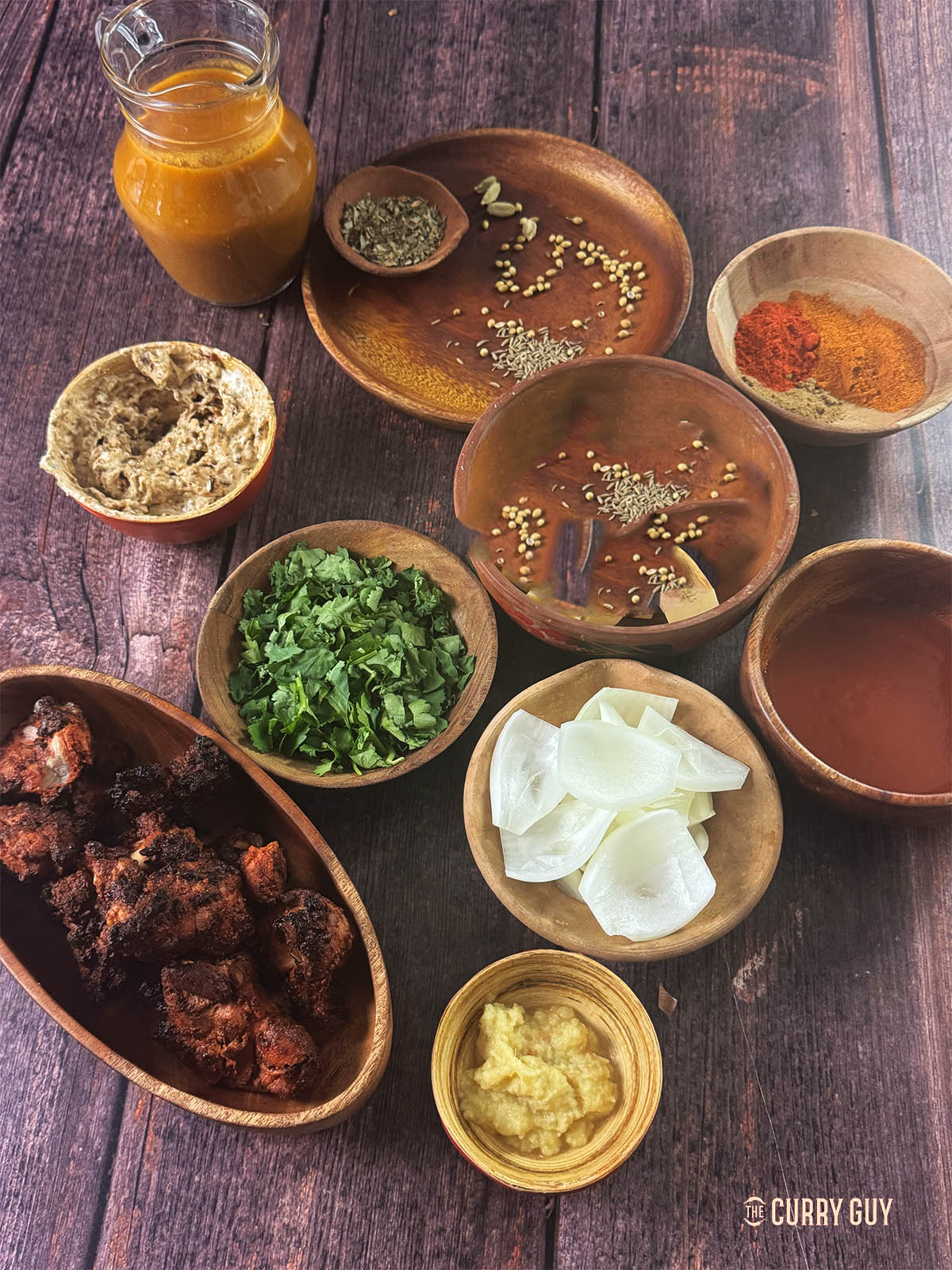 The ingredients for the recipe laid out on a counter top. 
