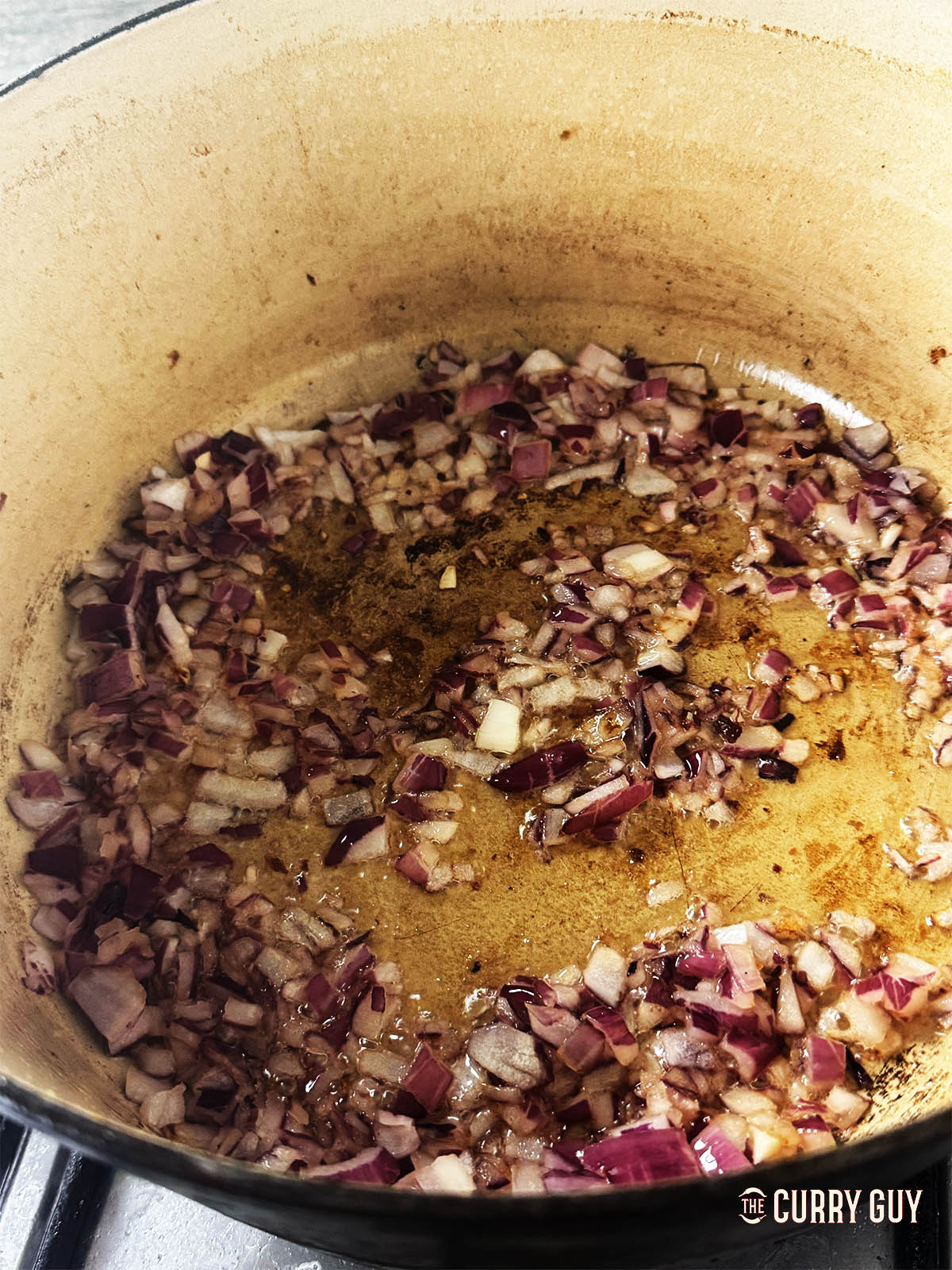 Frying the onion to soften in a little oil. 