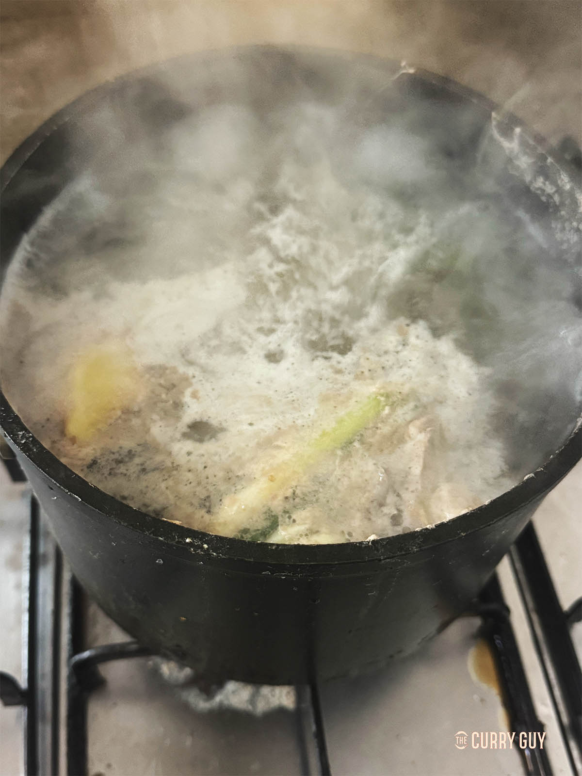 The ribs boiling in the aromatic water just before straining. 