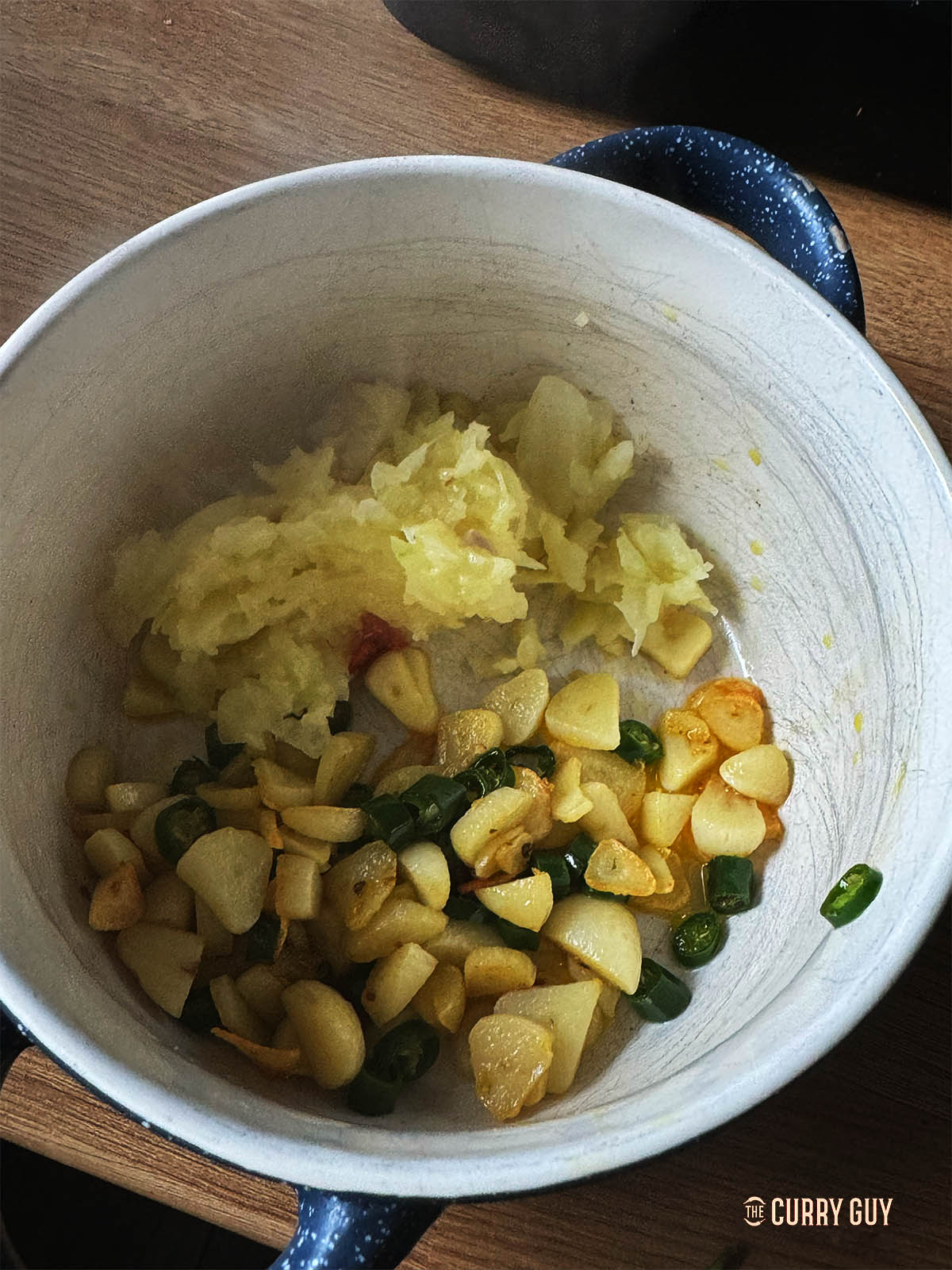 Fried garlic, chillies and onions in a dish. 